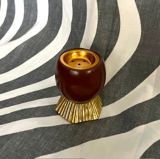 BROWN AND GOLD RESIN BURNER