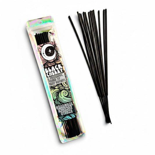 The Altared State Black Cherry charcoal incense sticks with a holographic package and a bundle of black incense sticks.